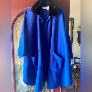 Women’s blue mid length coat.